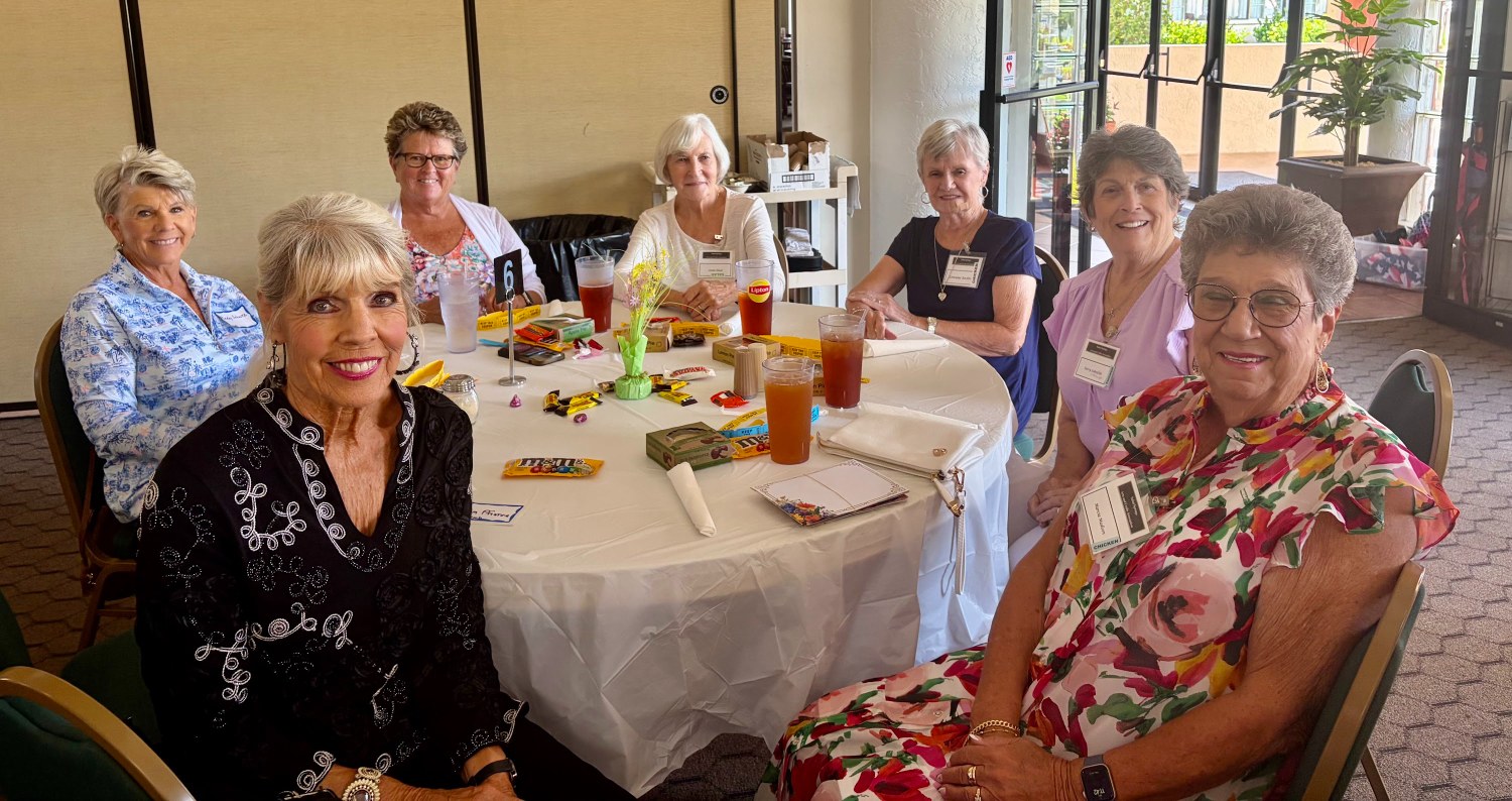 Arts & Crafts members at a decorated luncheon table