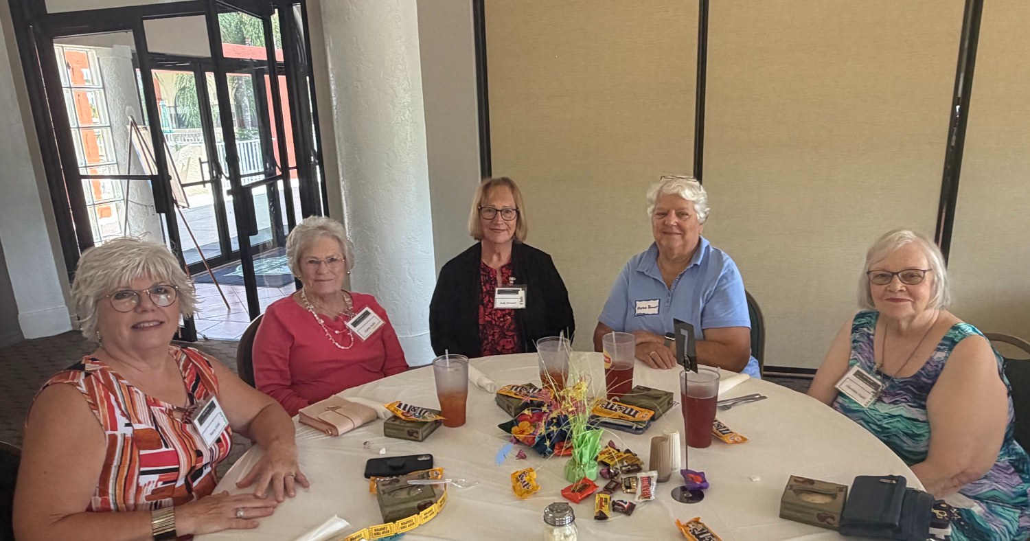Arts & Crafts members seated together at the July monthly luncheon