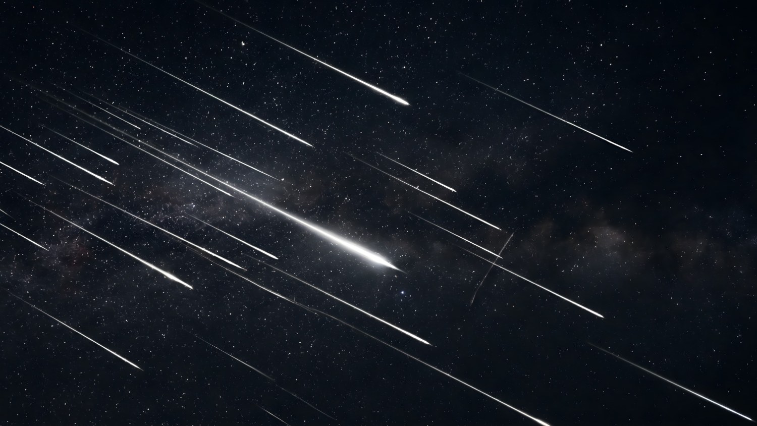 Meteors streaking across a star-filled night sky during the Leonid shower