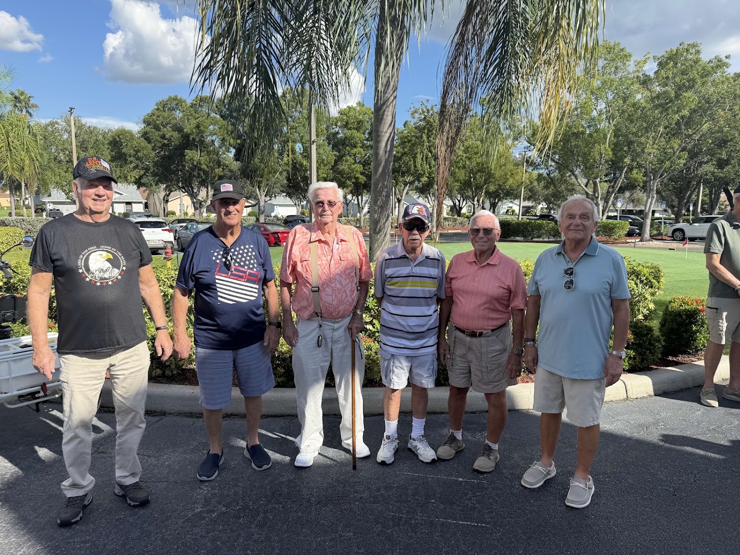 Sabal Springs Army veterans standing together outside the Clubhouse.